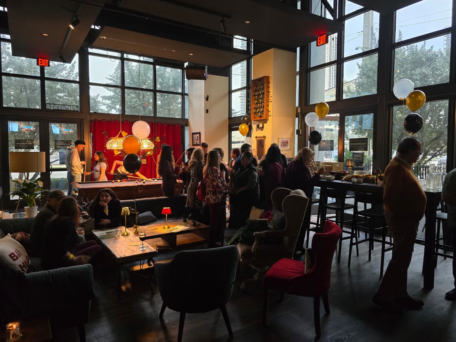 Guests celebrating with balloons at a birthday party at The Leinster