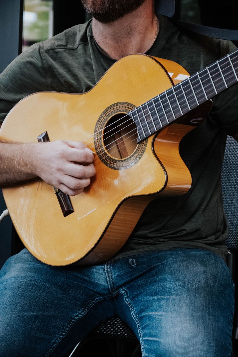 Live acoustic guitarist performing at St. Patrick's Day celebration in Edgewater Miami